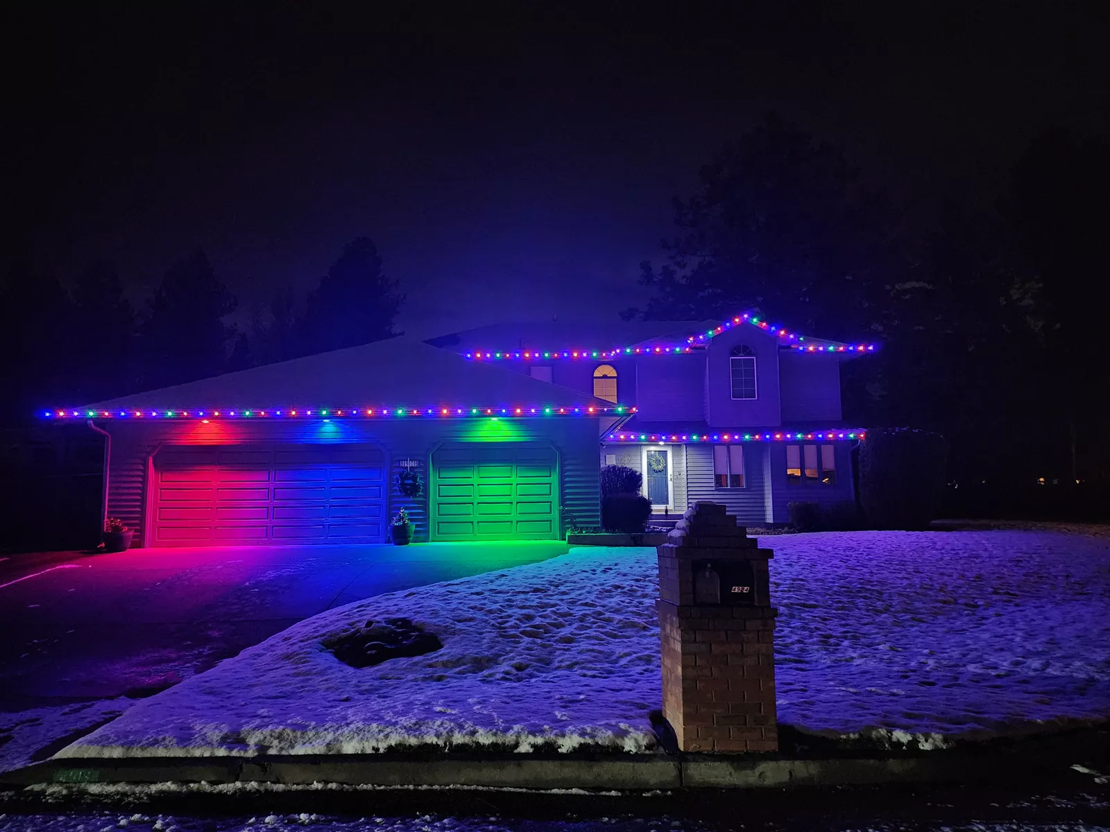 Professionally installed Christmas lights on a Spokane home